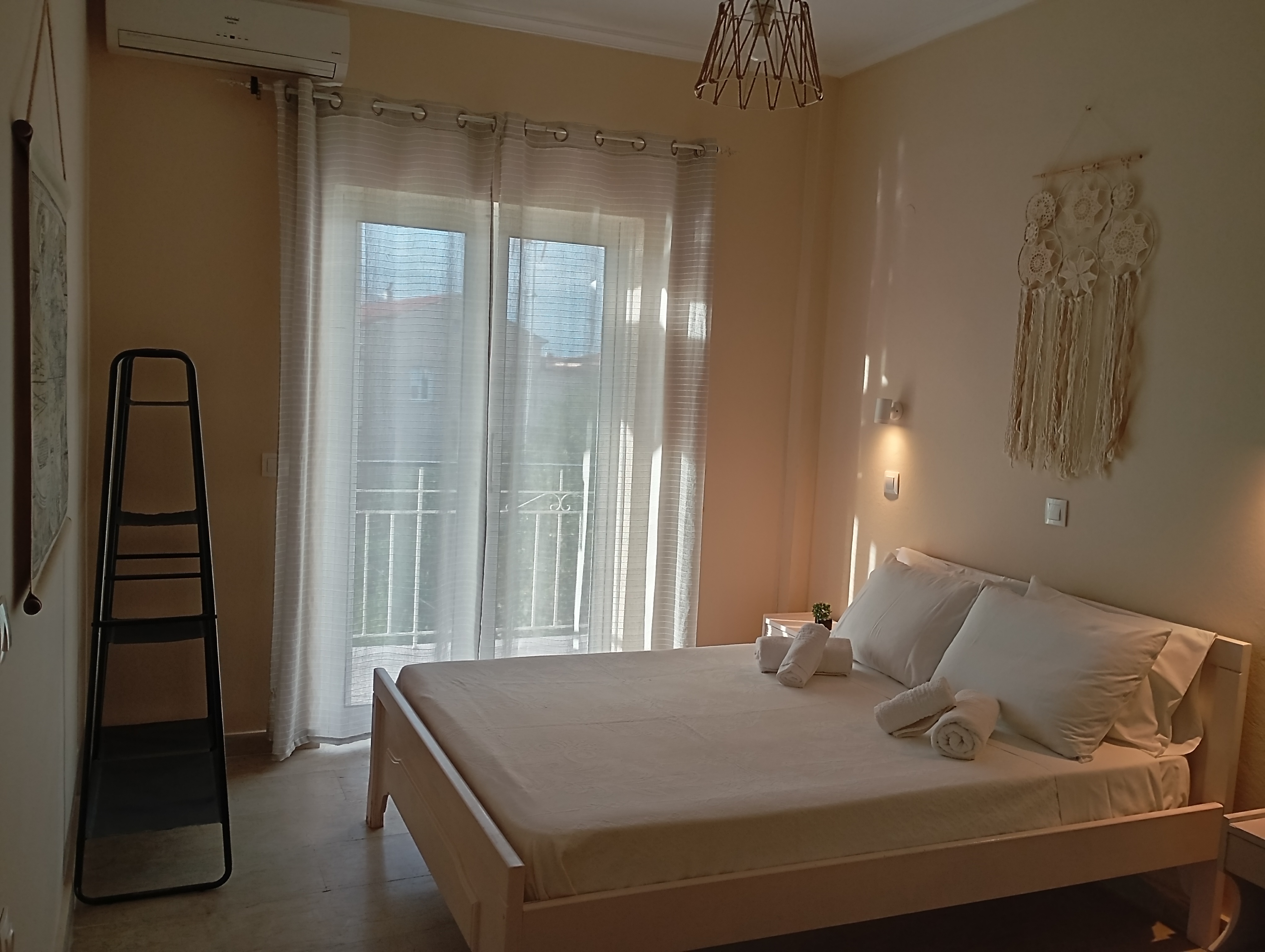 double bed in a cozy dim lighted room